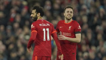 Salah double as Liverpool routs Man United 4-0 to top PL