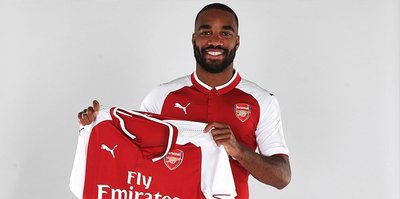 Arsenal casts tons of cash on Lacazette