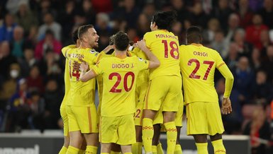Liverpool take Premier League title fight to final week