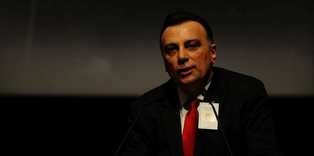 "Görevim Obama ve Putin'e forma giydirmek"