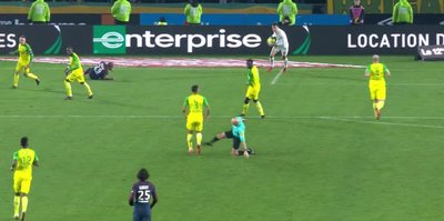 French referee suspended for aiming kick at player