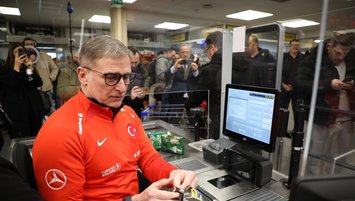 Stefan Kuntz works as cashier for quake victims