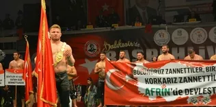 Başpehlivanlar şehitler için kol bağladı