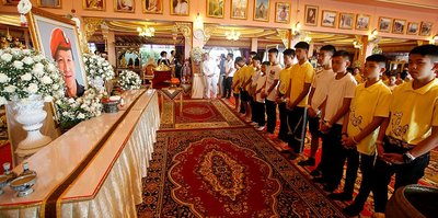 After rescue, Thai soccer boys pray for fortune at temple